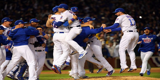 Oct 22, 2016; Chicago, IL, USA; The Chicago Cubs celebrate defeating the Los Angeles Dodgers in game six of the 2016 NLCS playoff baseball series at Wrigley Field. Cubs win 5-0 to advance to the World Series. Mandatory Credit: Jerry Lai-USA TODAY Sports